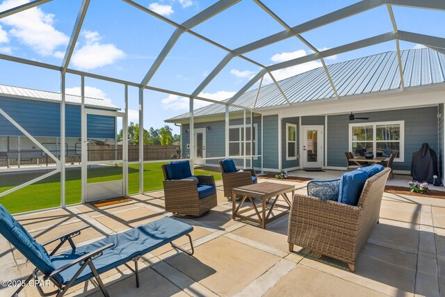 1825 White Western Lake Ln, Panama City, FL 32409 - view of patio / terrace featuring ceiling fan, an outdoor living space, and a lanai
