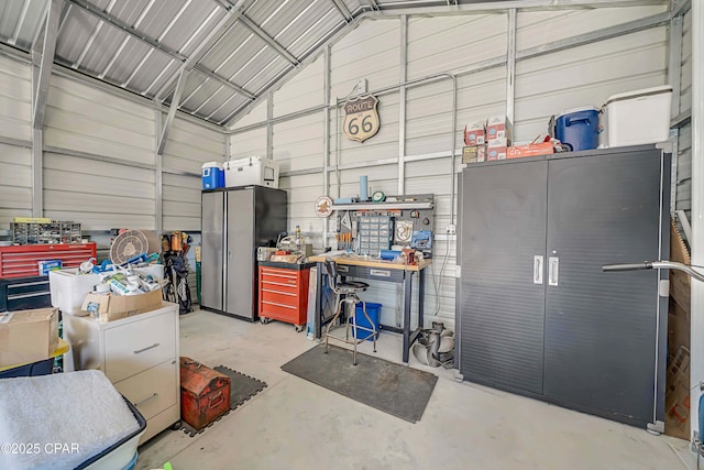 garage with a workshop area