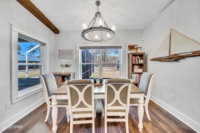 dining room featuring an inviting chandelier, beam ceiling, and dark wood-type flooring