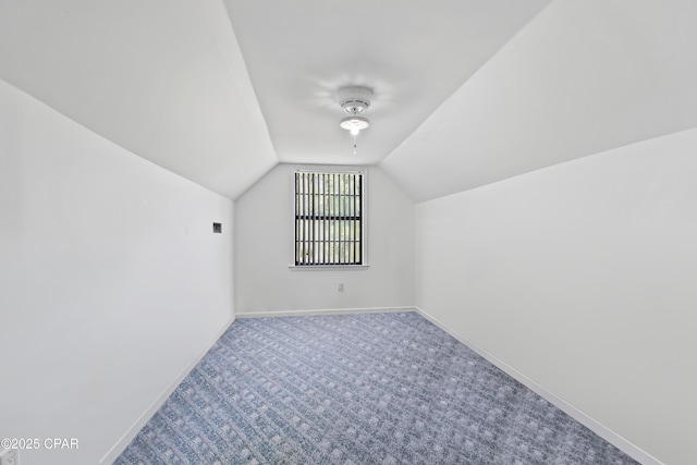 bonus room with carpet and lofted ceiling