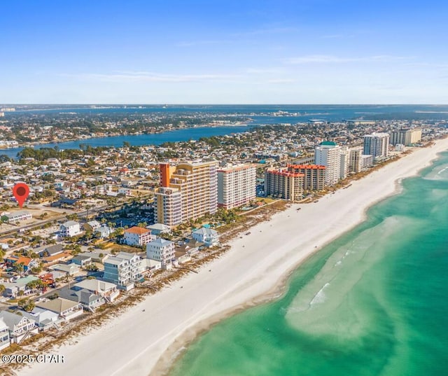 aerial view with a water view and a view of the beach