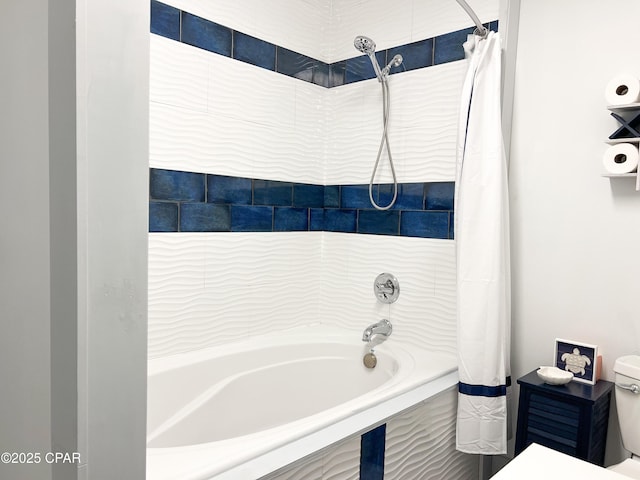 full bathroom with shower / tub combo and toilet