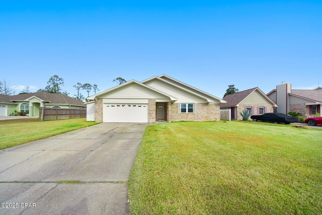 view of front facade with a garage and a front yard