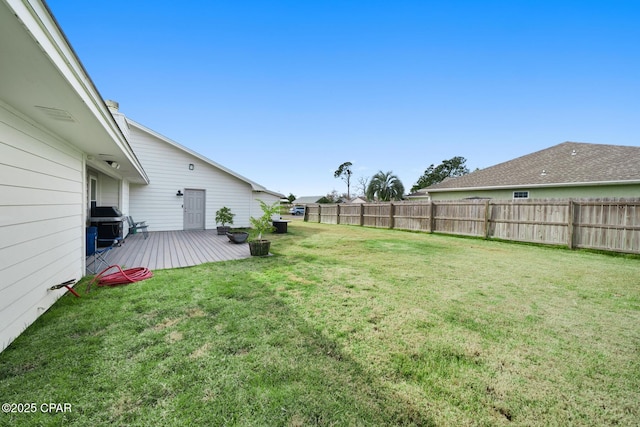 view of yard with a wooden deck