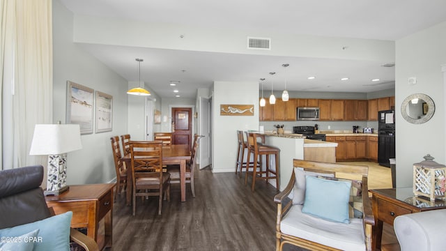 living room featuring dark wood-type flooring