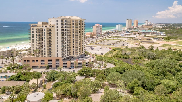 bird's eye view featuring a water view and a view of the beach