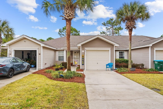 ranch-style home with a garage and a front yard