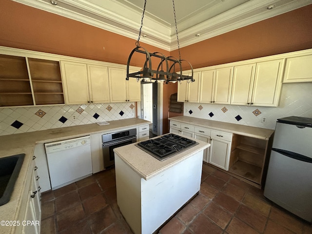 kitchen featuring stainless steel appliances, backsplash, hanging light fixtures, a kitchen island, and crown molding