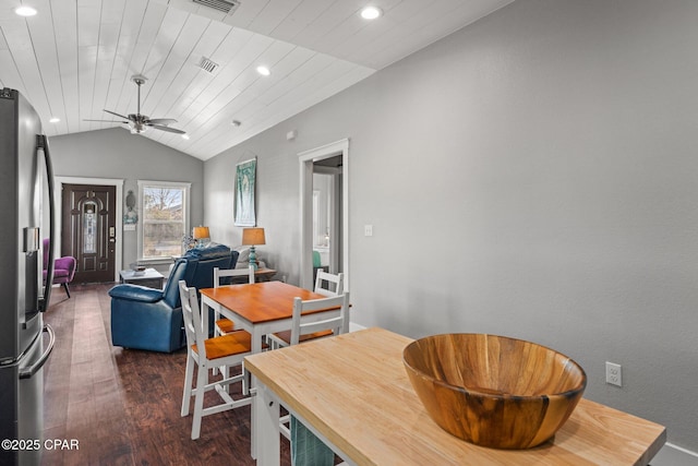 dining area featuring ceiling fan, dark wood-type flooring, lofted ceiling, and wood ceiling