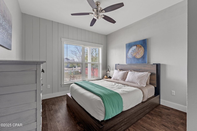 bedroom with dark wood-type flooring and ceiling fan