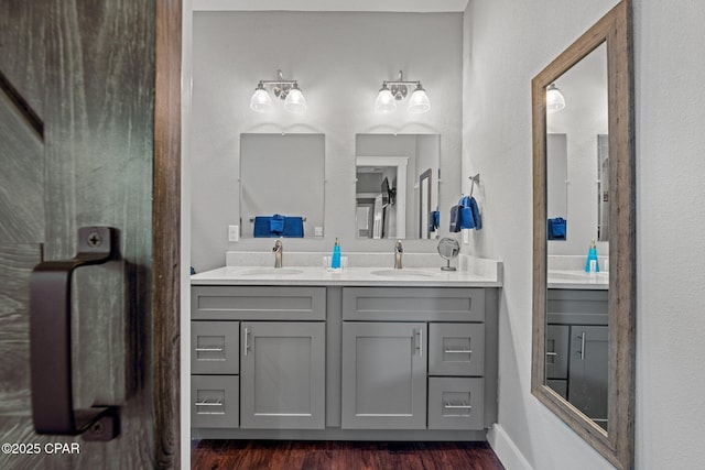 bathroom featuring hardwood / wood-style floors and vanity