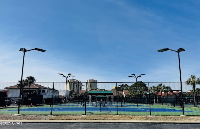 exterior space featuring tennis court