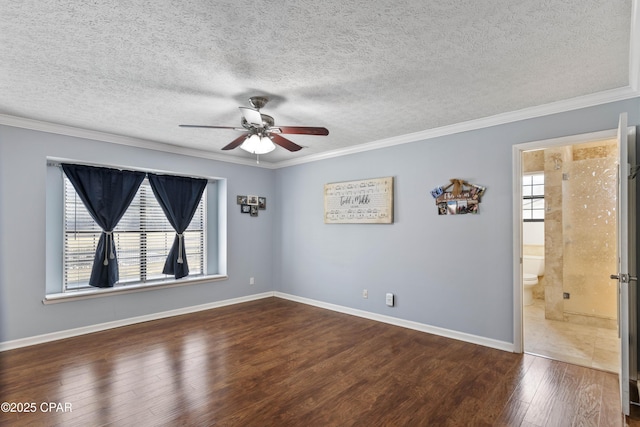 unfurnished room featuring ceiling fan, dark hardwood / wood-style flooring, crown molding, and a textured ceiling