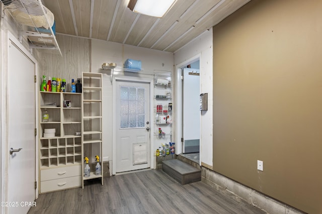 interior space featuring wooden ceiling and hardwood / wood-style floors