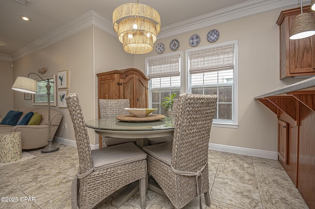 dining space featuring a chandelier and ornamental molding