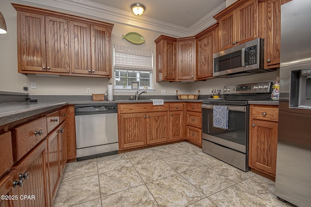 kitchen featuring light tile patterned floors, appliances with stainless steel finishes, sink, and crown molding