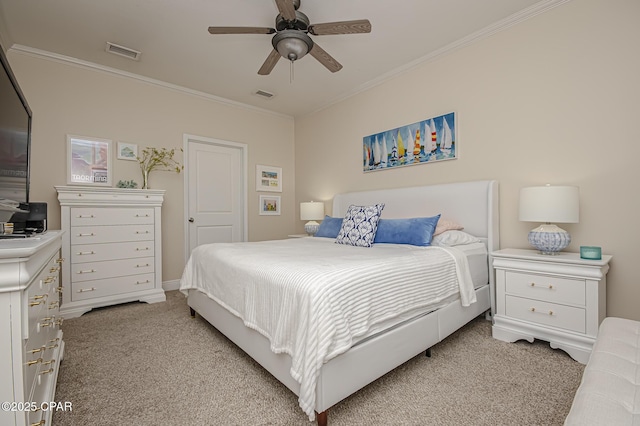 bedroom featuring ceiling fan, light colored carpet, and ornamental molding