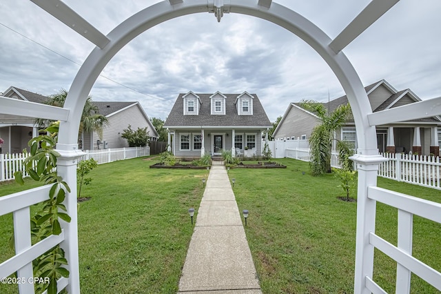 view of front of house featuring a front lawn and a porch