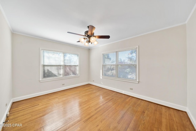 spare room featuring light wood-type flooring, ceiling fan, and ornamental molding