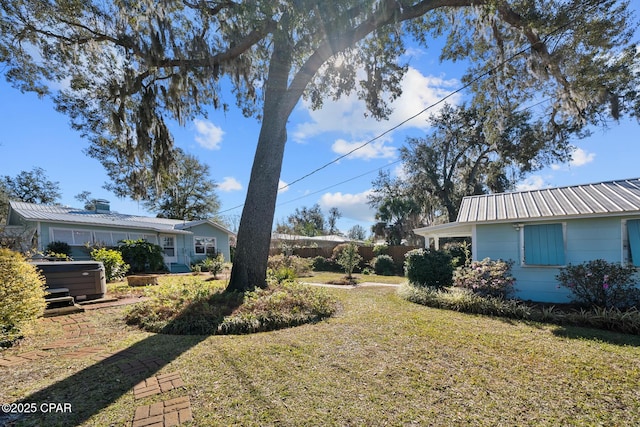 view of yard featuring a hot tub