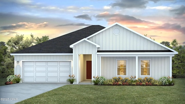 view of front of home featuring driveway, roof with shingles, an attached garage, board and batten siding, and a front yard