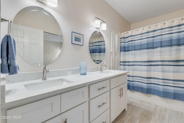 bathroom with vanity and shower / tub combo