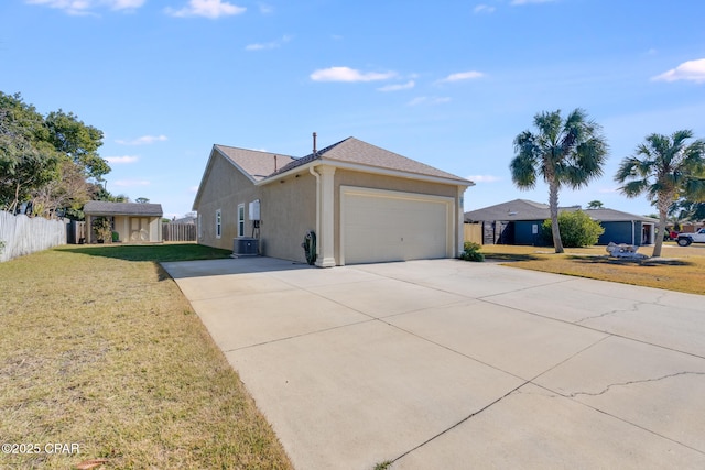 view of side of property with cooling unit and a yard