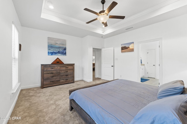 bedroom featuring a raised ceiling, visible vents, ornamental molding, light carpet, and baseboards