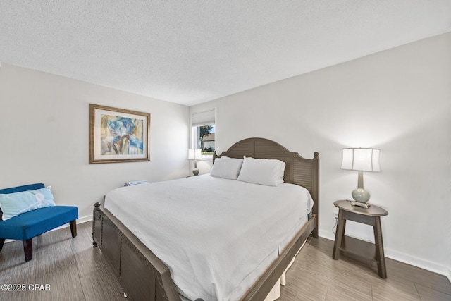 bedroom featuring a textured ceiling