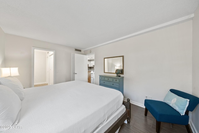 bedroom featuring dark wood-type flooring