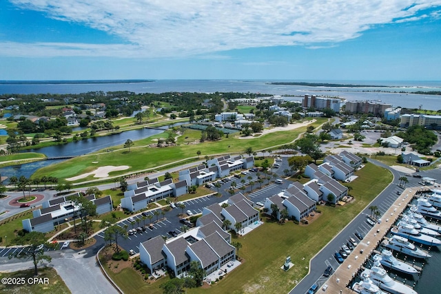 birds eye view of property featuring a water view