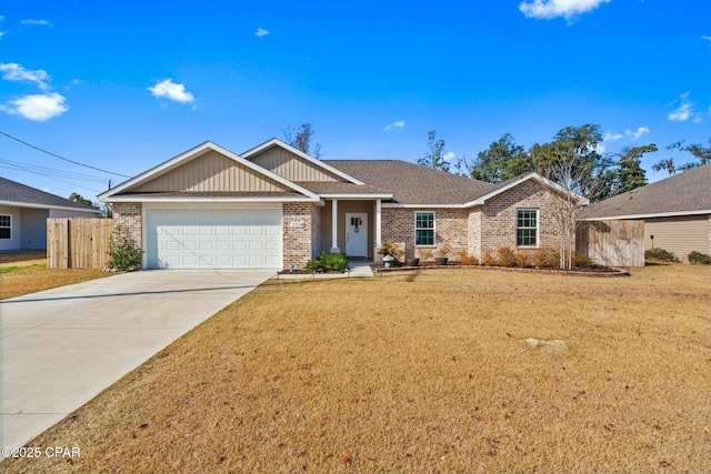 ranch-style home featuring a garage and a front lawn