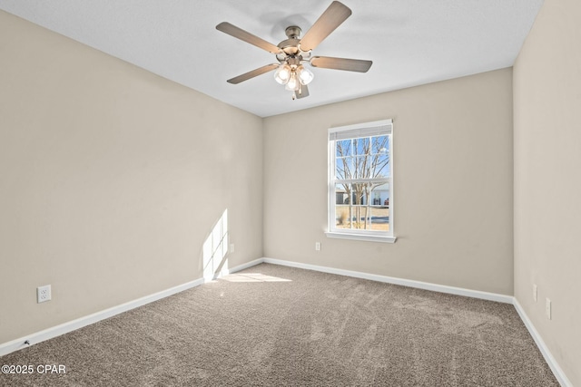 unfurnished room with carpet floors and ceiling fan