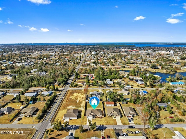 drone / aerial view with a water view