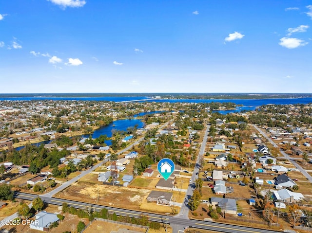 drone / aerial view with a water view