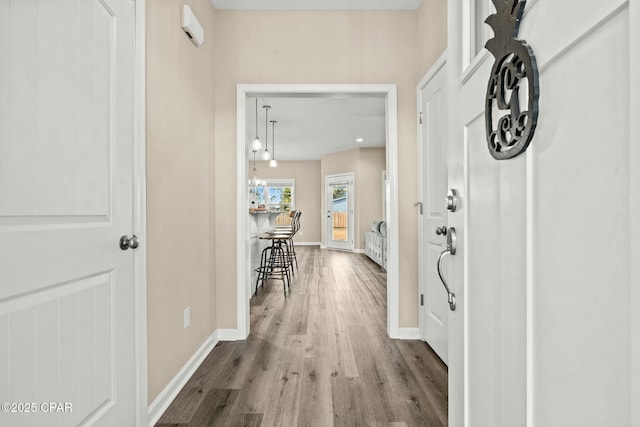 hall featuring hardwood / wood-style flooring