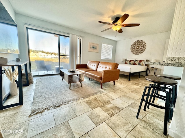 living room with ceiling fan