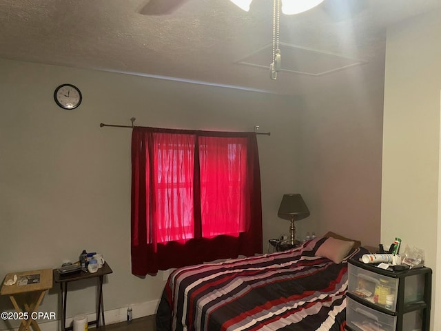 bedroom featuring a textured ceiling