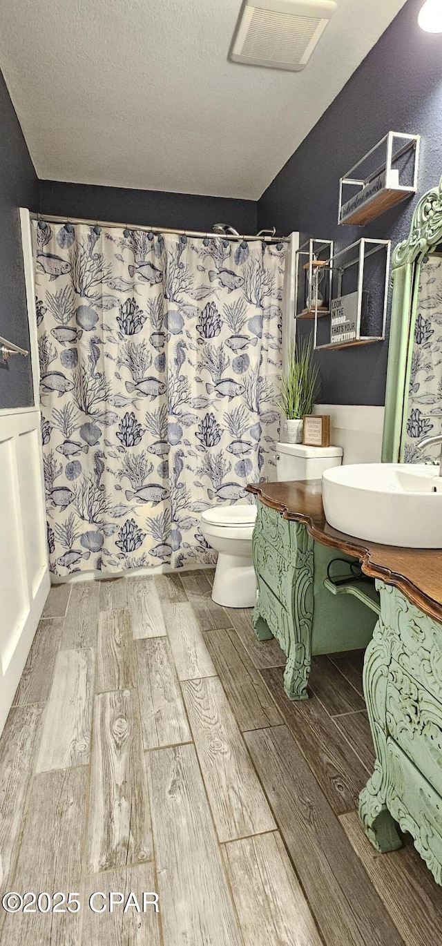 bathroom with sink and toilet