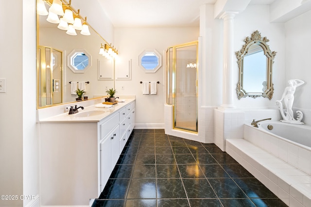 bathroom featuring vanity, separate shower and tub, and ornate columns