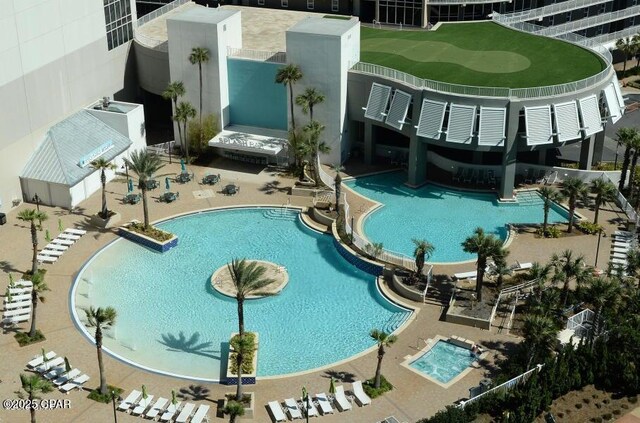 community pool featuring a patio area