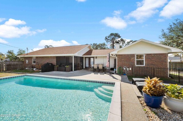 view of pool featuring a patio