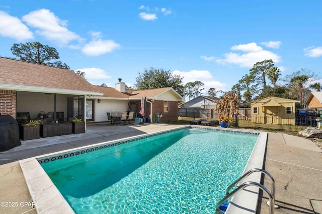 view of pool with a patio area