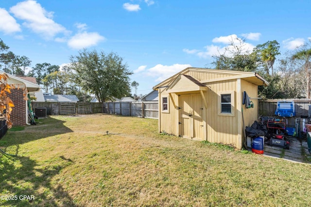 view of yard with a storage shed