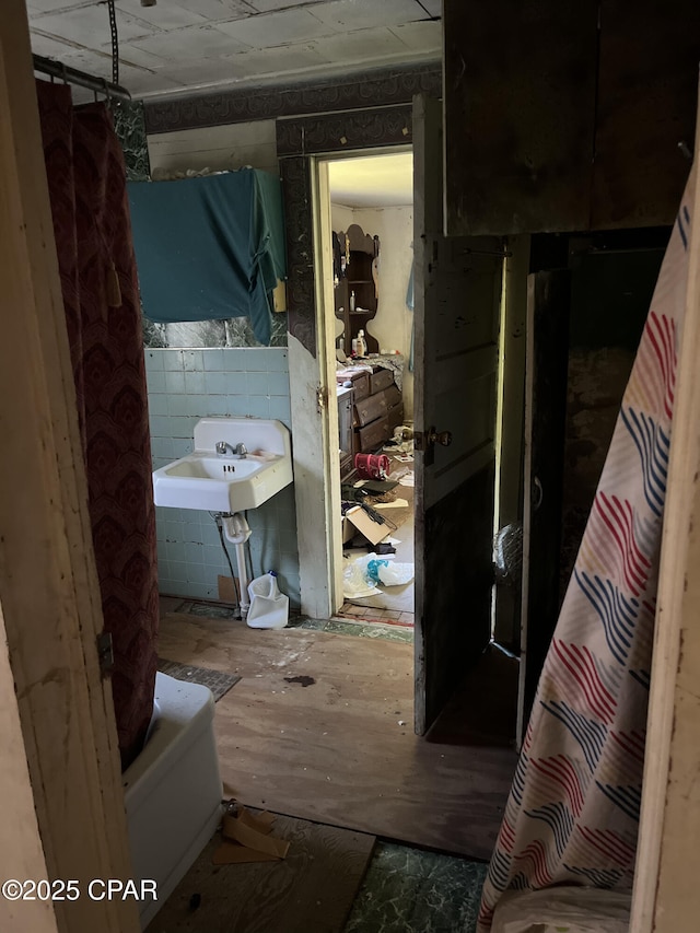 hallway featuring sink