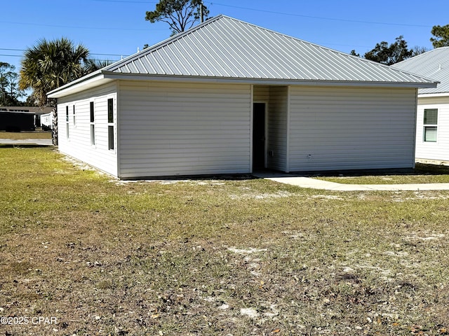 exterior space with a yard