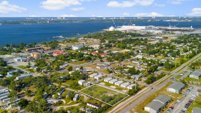 drone / aerial view with a water view