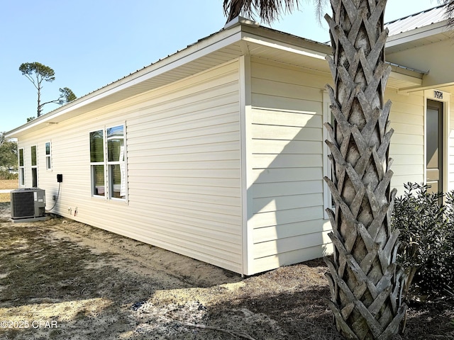 view of property exterior with central air condition unit