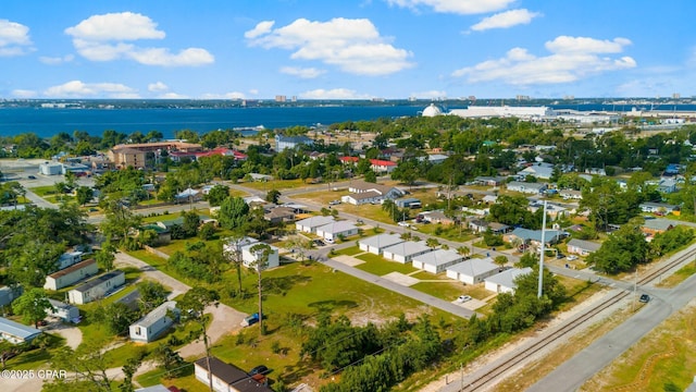 birds eye view of property featuring a water view