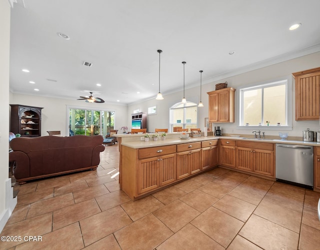 kitchen featuring stainless steel dishwasher, sink, decorative light fixtures, kitchen peninsula, and ornamental molding